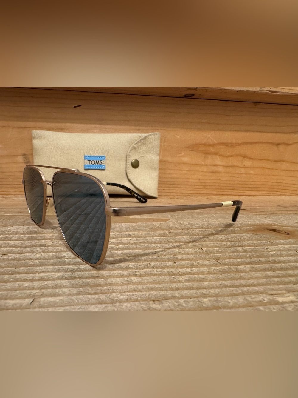 TOMS aviator sunglasses in gold with gray lenses